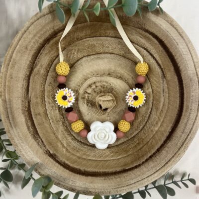 Collier d'allaitement tournesol papillon et vieux rose