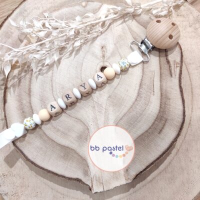 Attache tétine crème